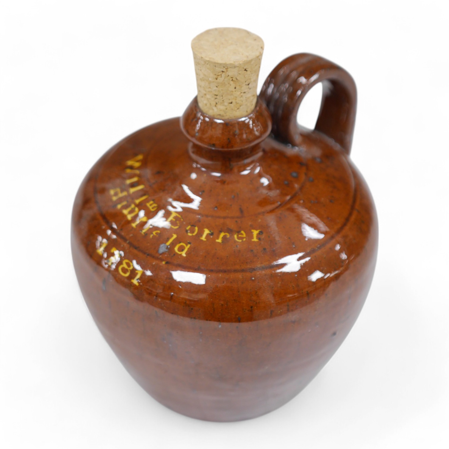 A Dicker Pottery flagon commemorating 'William Borrer, Hinfield, 1781', 13.5cm high. Condition - small glazing faults